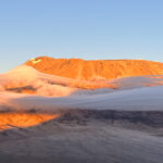 Sunrise on Kibo Crater, the highest point of Kilimanjaro, as seen from Mawenzi, Kilimanjaro's second highest peak, during the Climb Kilimanjaro Expedition with the Life Happens Outdoors team.