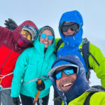 Summit of Mont Blanc with IFMGA guide Philippe Genin and LHOers Mariz Doss and Fatima Sajwani, who became the first Emirati woman to summit Mont Blanc, during the Mont Blanc Summit Course with the Life Happens Outdoors team.
