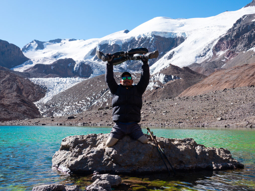 Hari Budha Magar, the first double over-the-knee amputee to climb Everest, at the lake of Plaza de Mulas (Aconcagua Base Camp) during his successful Aconcagua Expedition with the Life Happens Outdoors team.