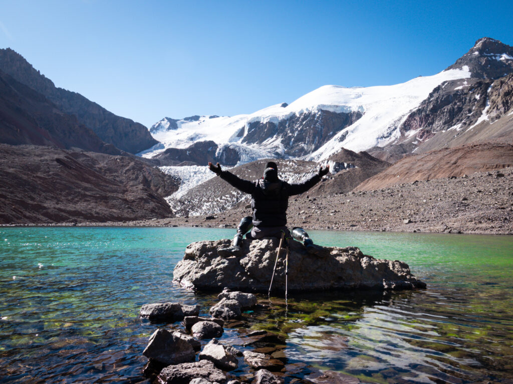Hari Budha Magar, the first double over-the-knee amputee to climb Everest, at the lake of Plaza de Mulas (Aconcagua Base Camp) during his successful Aconcagua Expedition with the Life Happens Outdoors team.