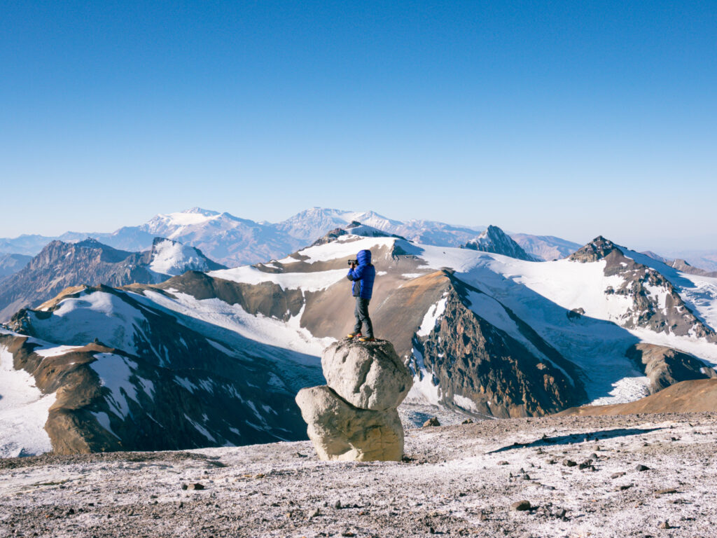IFMGA guide Abiral Rai taking a few shots from Camp 2, Nido de Cóndores, with Hari Budha Magar, the first double over-the-knee amputee to climb Everest, during his successful Aconcagua Expedition with the Life Happens Outdoors team.