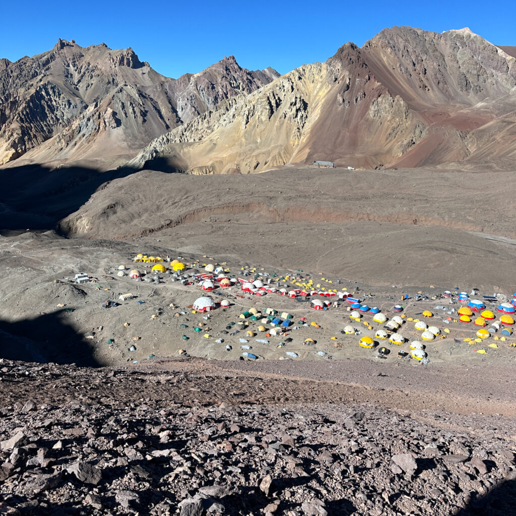 Base Camp, Plaza de Mulas, appearing over the last hill as we descended from Camp 2 during the Aconcagua Expedition with the Life Happens Outdoors team.