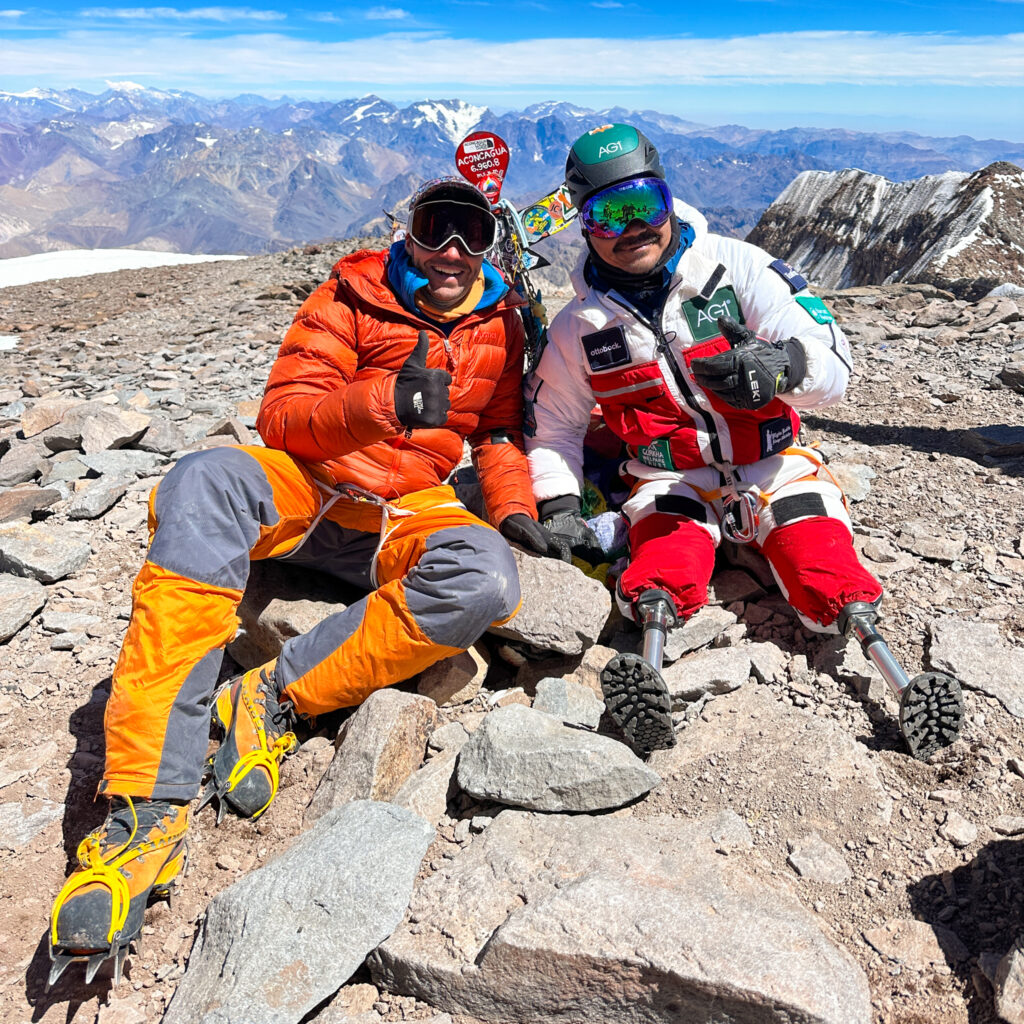 Hari Budha Magar, the first double over-the-knee amputee to climb Everest, on the summit of Aconcagua with LHO founder, expedition organizer, and team leader Rami Rasamny during his successful Aconcagua Expedition with the Life Happens Outdoors team.
