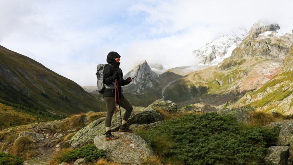 Trekking through Val Veny beneath Rifugio Elisabetta on the Tour du Mont Blanc trail, en route to Col de la Seigne.
