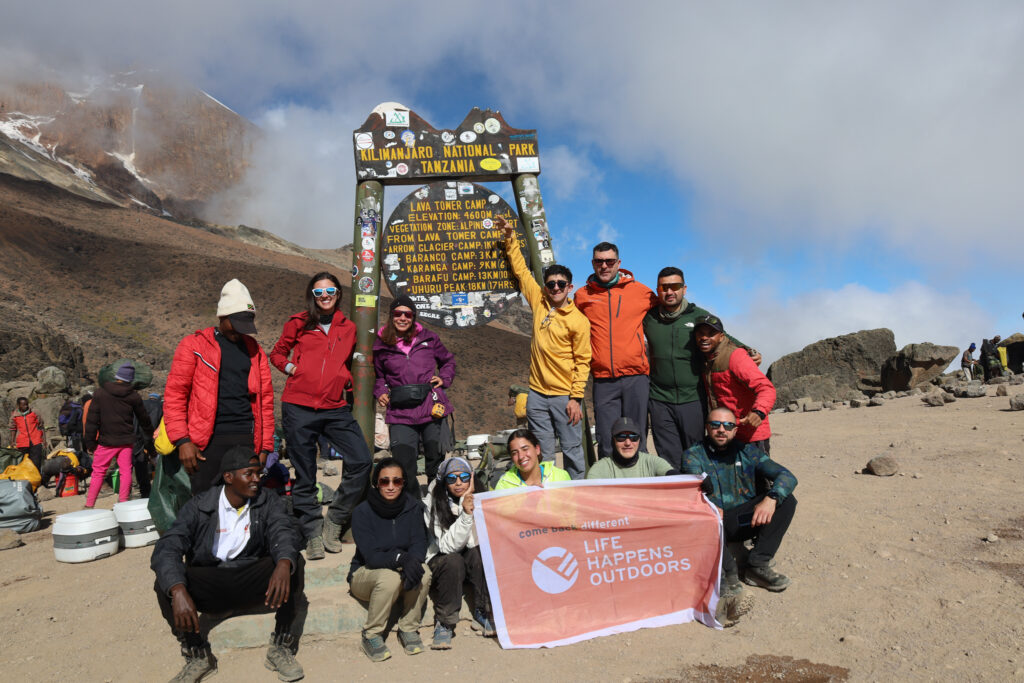 The LHO team poses for a group photo at Lava Tower on the Machame Route during their Mount Kilimanjaro climb.