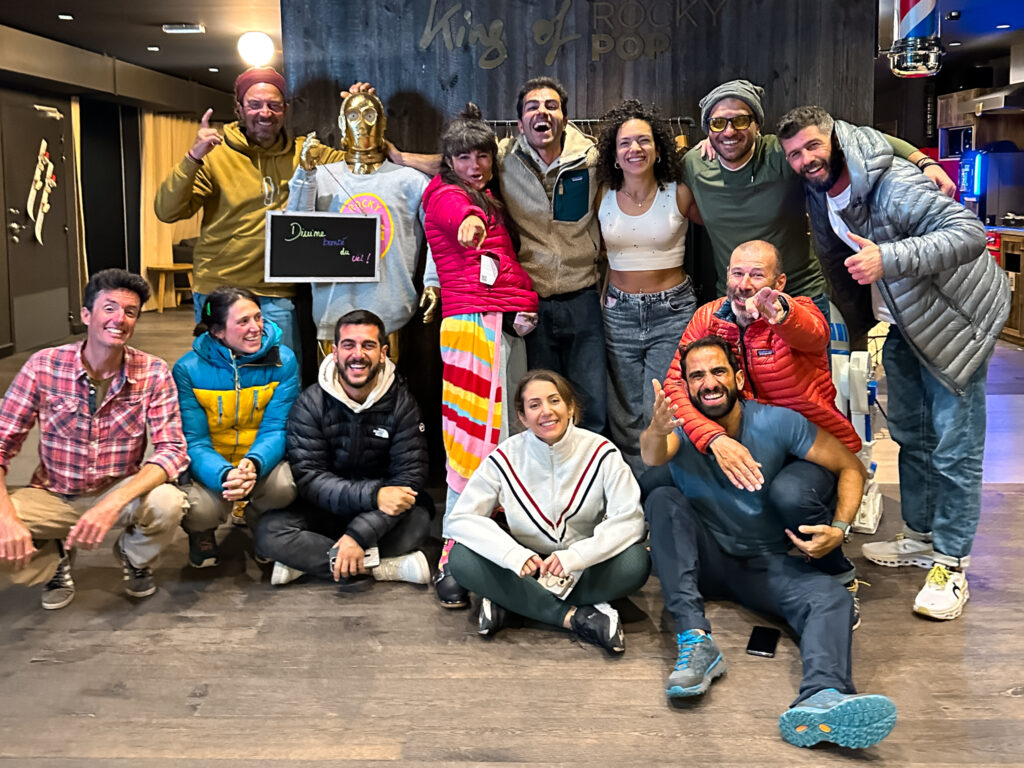 The Life Happens Outdoors team—including founder Rami Rasamny and IFMGA guides Babis Marinidis, Lucia Guichot Martin, François Xavier, and Pavlos Tsiantos—gather at the Rocky Pop Hotel in Les Houches to mark the end of the summer mountaineering season.