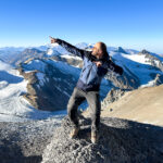 Frederic Sfeir at Camp 2 on Aconcagua with the Andes Mountains behind him during his climb with Life Happens Outdoors. Despite living with retinitis pigmentosa, Fred continues to defy limits on high altitude expeditions.