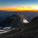 Sunrise on the way to the summit of Aconcagua from Plaza Independencia, capturing high altitude light over the Andes during a climb of Mt Aconcagua.