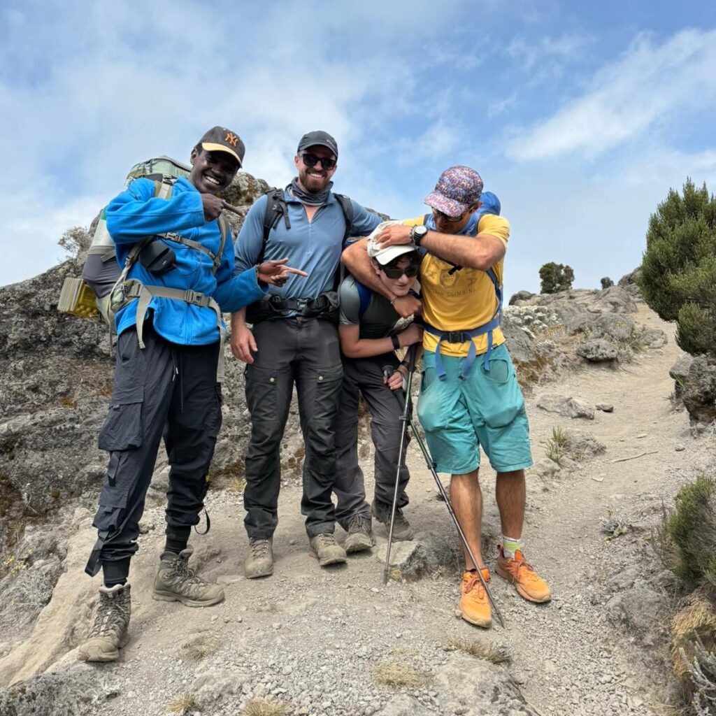 Christopher Nicholas Abboud sharing a lighthearted moment with LHO founder Rami Rasamny, LHO guide William, and HALO Trust member Tom Hamill.