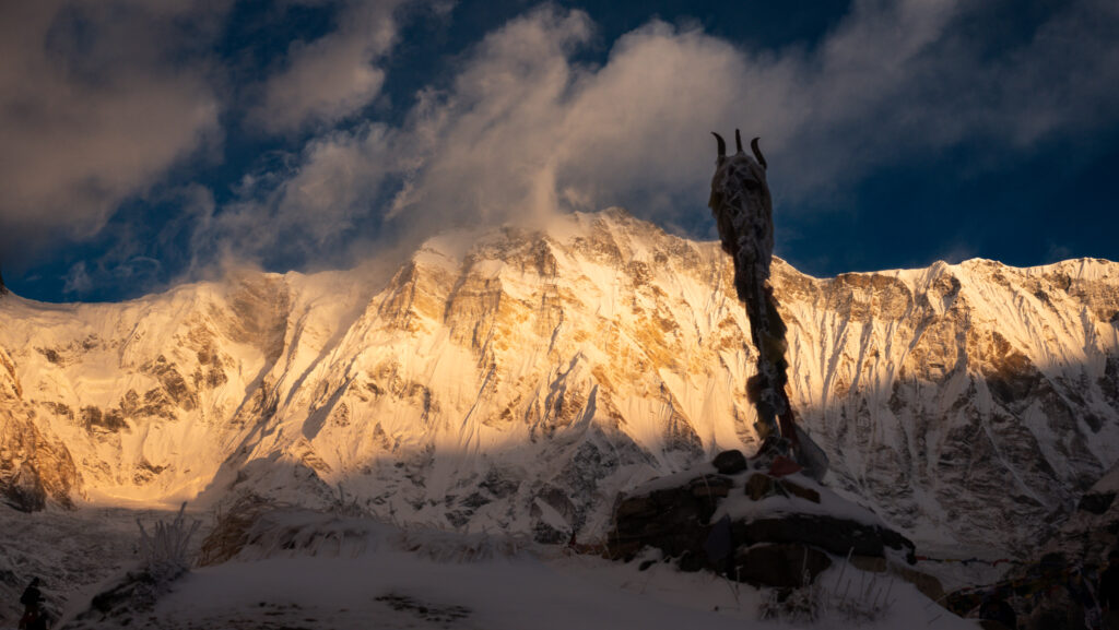 Sunrise illuminating the south face of Annapurna from Annapurna Base Camp in Nepal’s Himalayas.