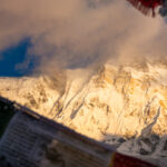 Annapurna Base Camp surrounded by Himalayan peaks at sunrise, showing the location of ABC in Nepal’s Annapurna Sanctuary along the popular trekking route.