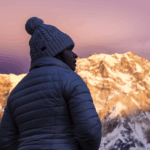 Life Happens Outdoors community member watching sunrise at Annapurna Base Camp with Annapurna South in the Annapurna Sanctuary