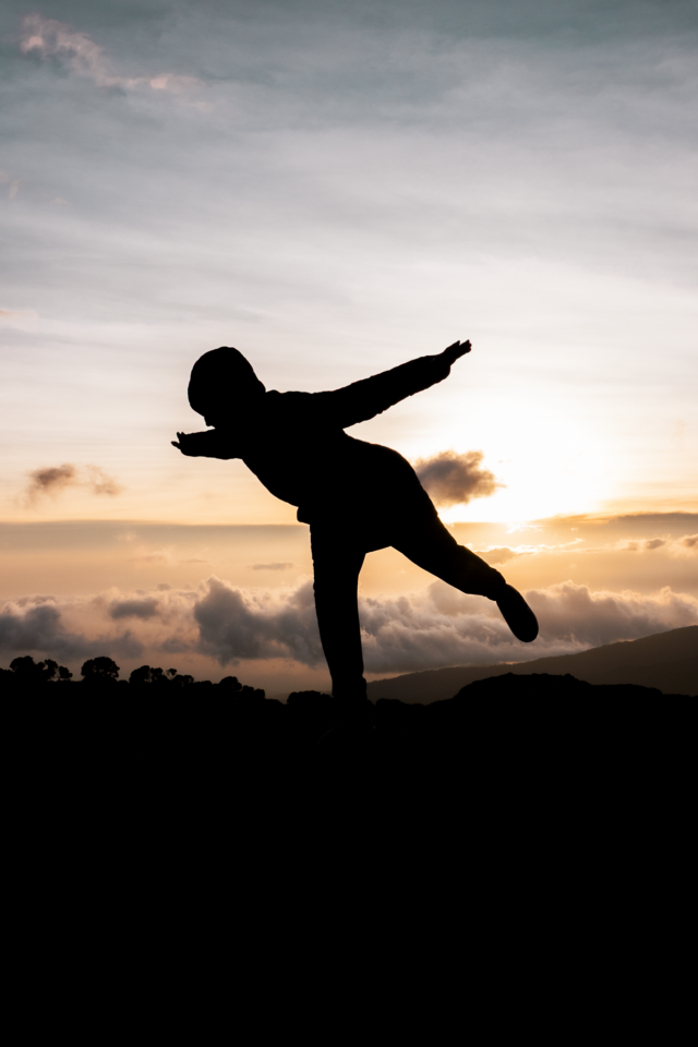 Life Happens Outdoors community member on a corporate Kilimanjaro challenge trek, capturing the spirit of a purpose led team retreat