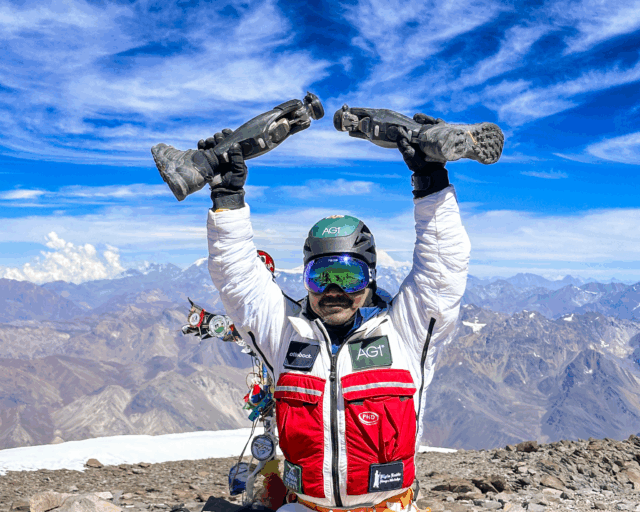 Hari Budha Magar on the summit of Aconcagua with Life Happens Outdoors, becoming the first double over the knee amputee to summit Aconcagua.