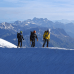 Life Happens Outdoors rope team practicing glacier travel skills with ice axes on Mont Blanc, training for a safer Goûter Route ascent on the Mont Blanc Summit Course