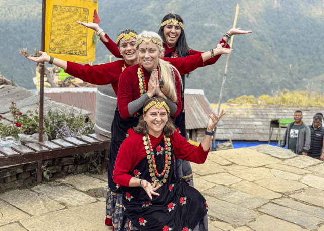 Life Happens Outdoors community members wearing local garments in the Annapurna region during the Annapurna Base Camp trek.