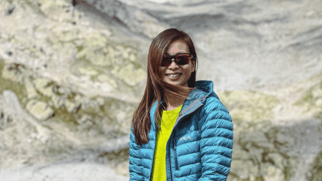 Life Happens Outdoors community member at Lac Blanc on the Tour du Mont Blanc, taking in alpine views above Chamonix.