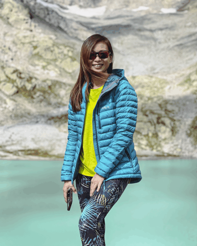 Life Happens Outdoors community member at Lac Blanc on the Tour du Mont Blanc, taking in alpine views above Chamonix.