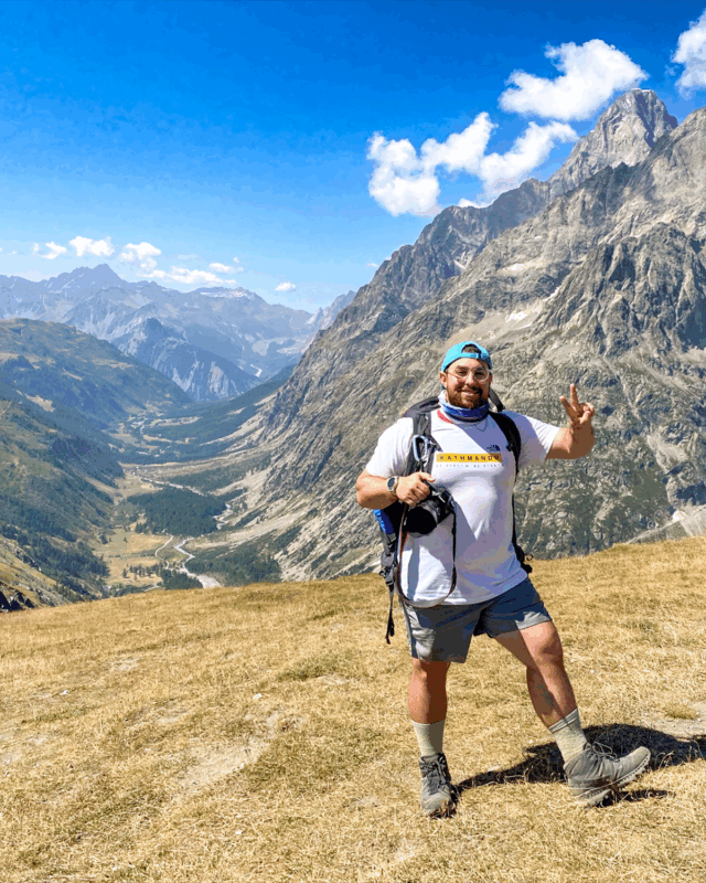 Life Happens Outdoors Team Leader on the Tour du Mont Blanc at Grand Col Ferret on the Switzerland Italy border.