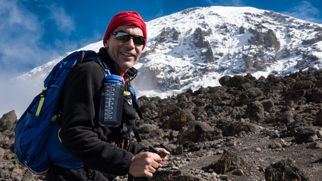 Life Happens Outdoors community member hiking on the trail to Mount Kilimanjaro during summit training