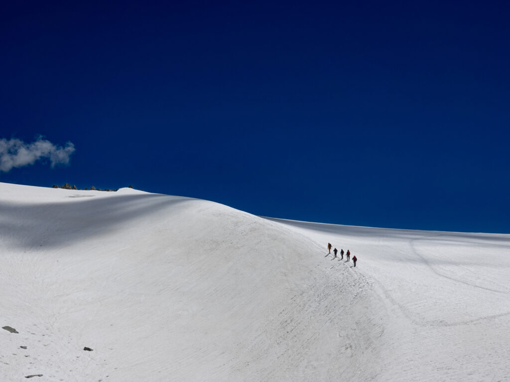 Life Happens Outdoors community members roped up while crossing the Vallée Blanche glacier on their first day.
